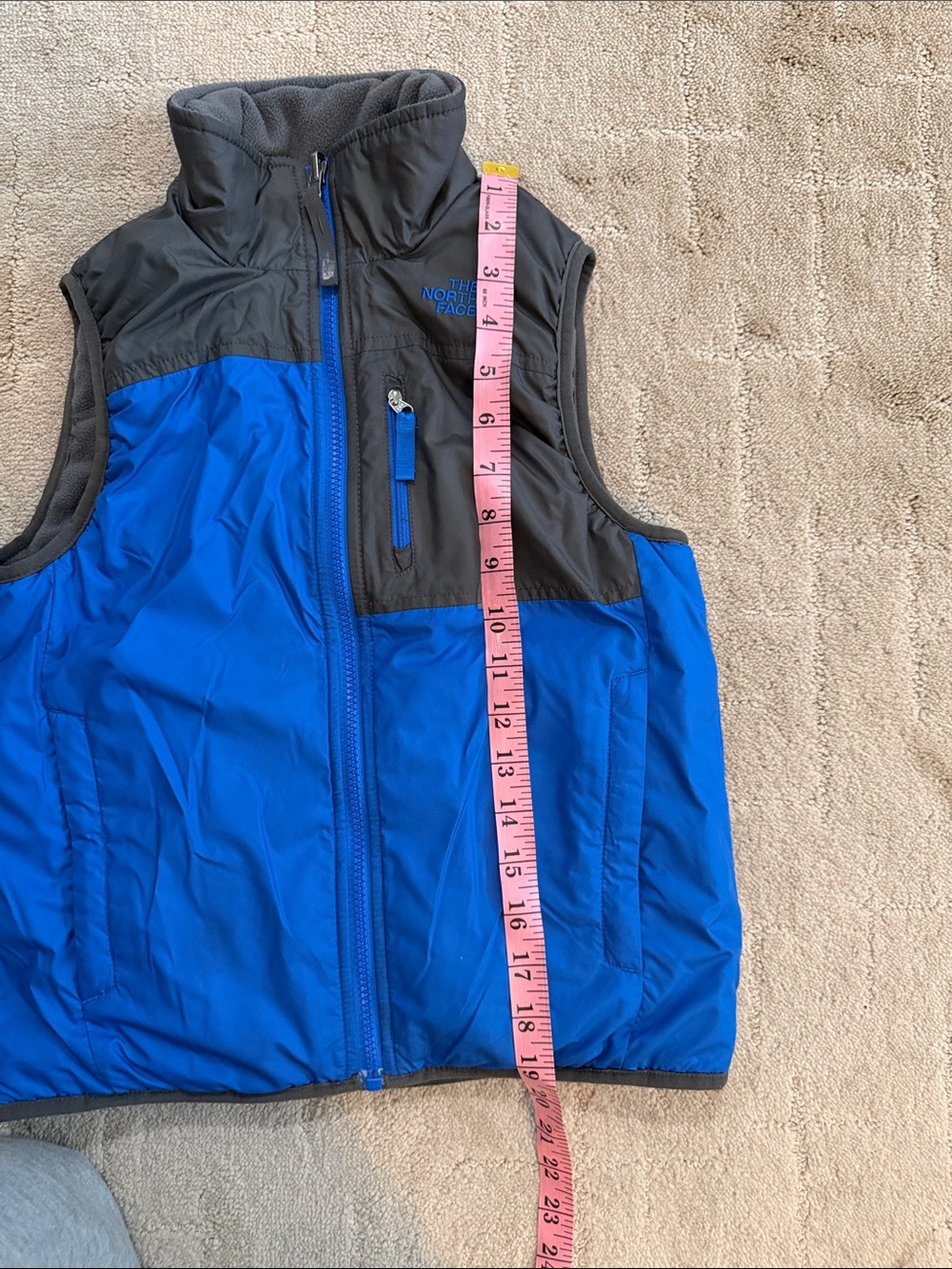 The North Face Boys Blue and Gray Puffer Vest reversible. - Picture 4 of 5
